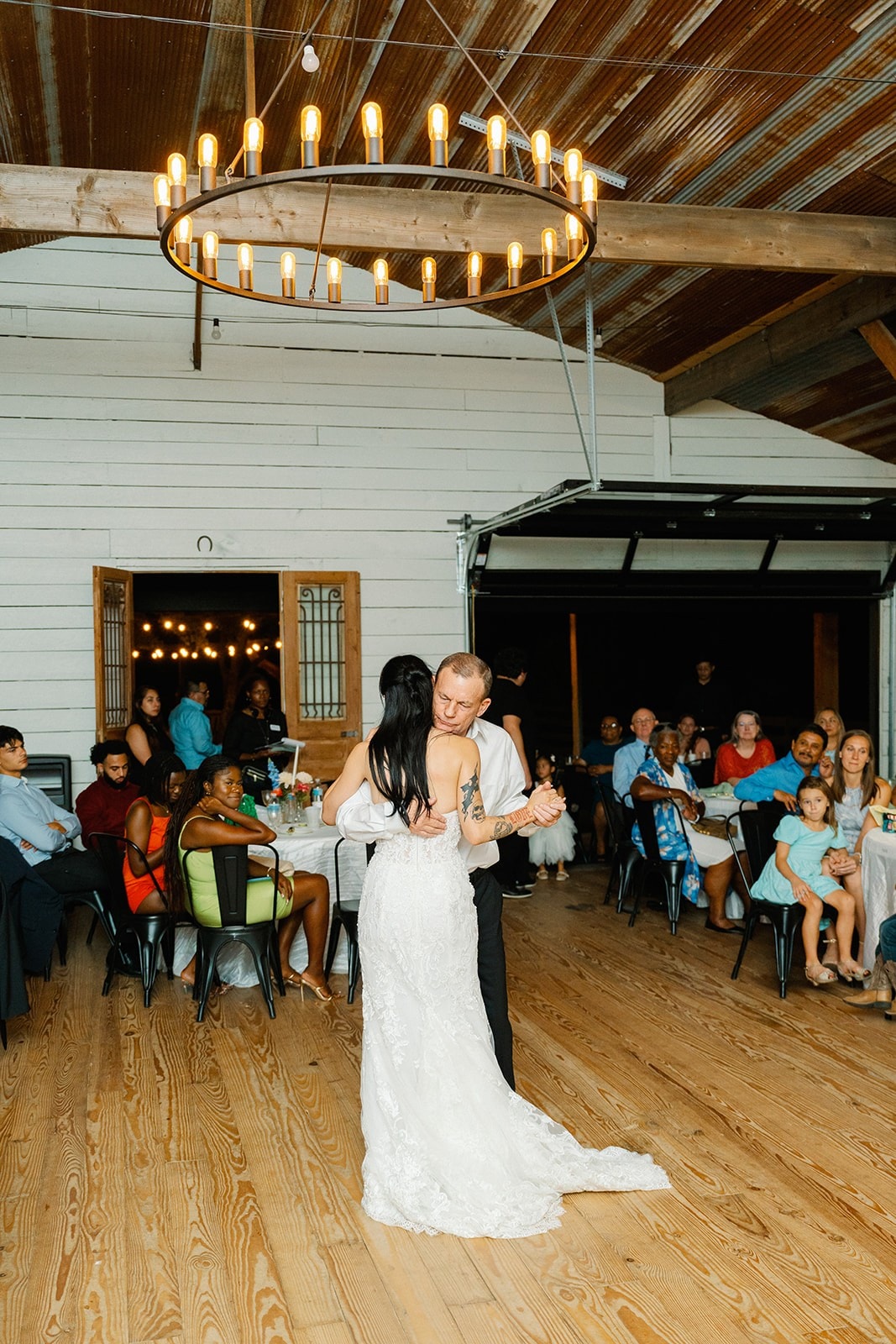 Outdoor wedding reception with string lights at Willow Sky Ranch, Texas Hill Country — romantic evening celebration near Fredericksburg, TX
